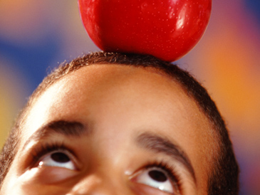 Apple on boy's head