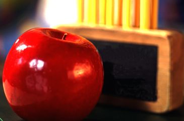 Red apple and pencils